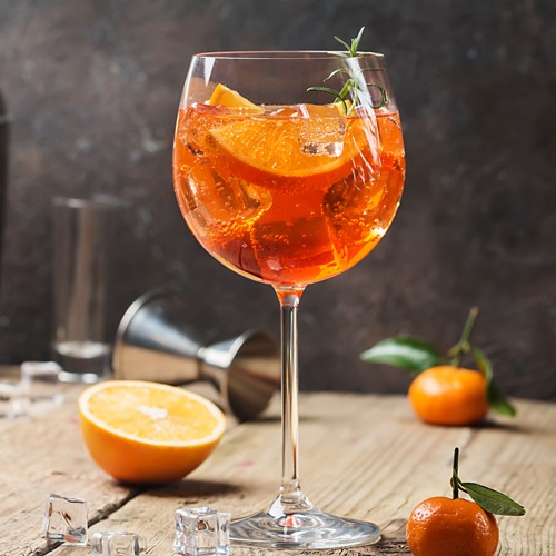 Aperol Spritz: a vibrant orange cocktail with Aperol, sparkling wine, and a slice of orange.